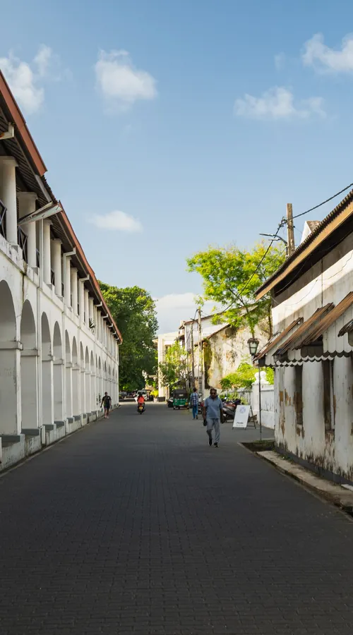 Dutch colonial arcade lining a quiet street inside Galle Fort